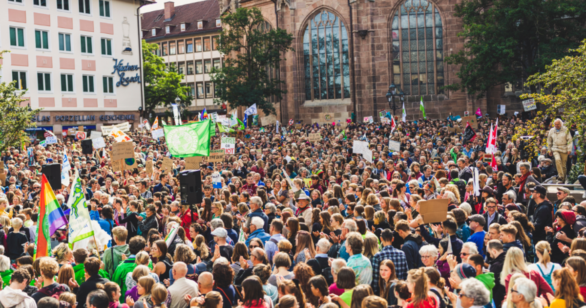 A crowd of people at a protest