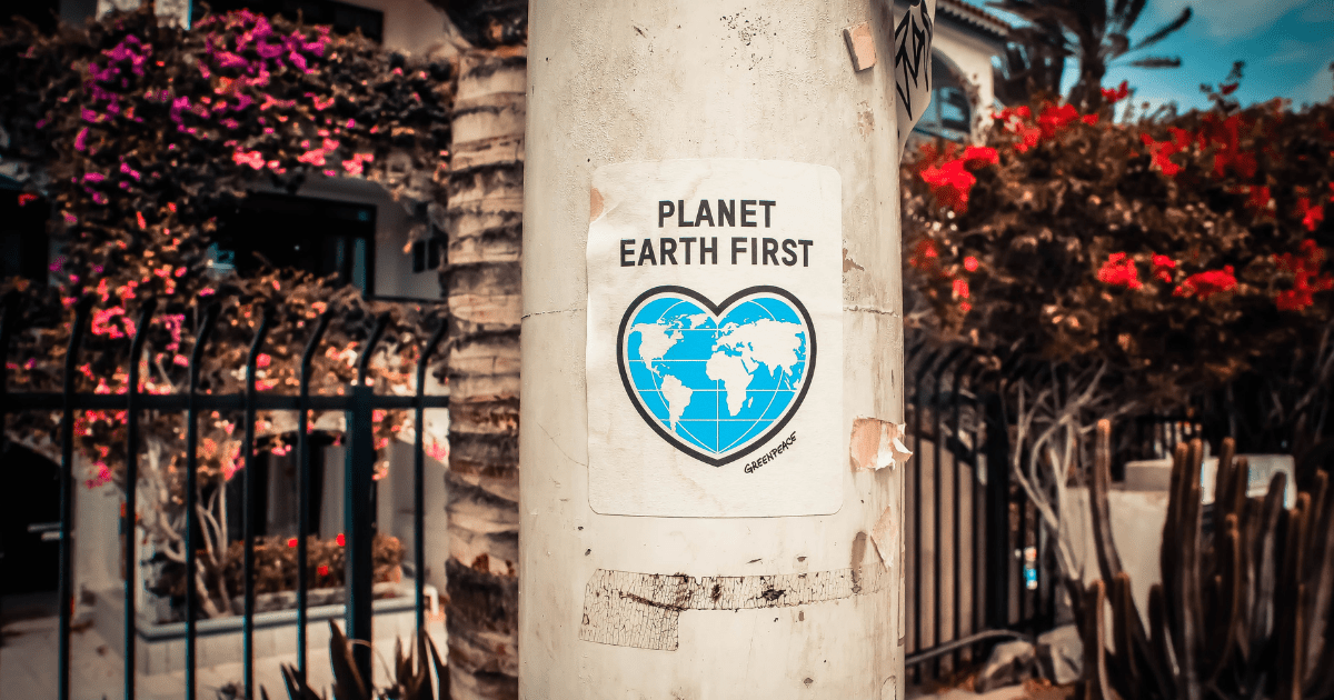 A sign on a post reading "Planet Earth First"
