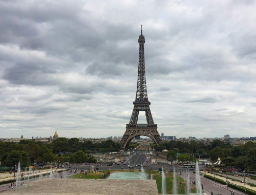 An image of the Eiffel Tower on a cloudy day