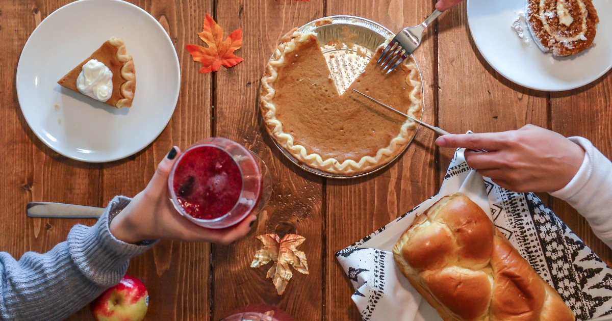 Two people eating a thanksgiving meal