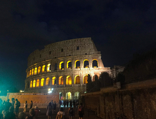 A photo of the Roman Colosseum at night time