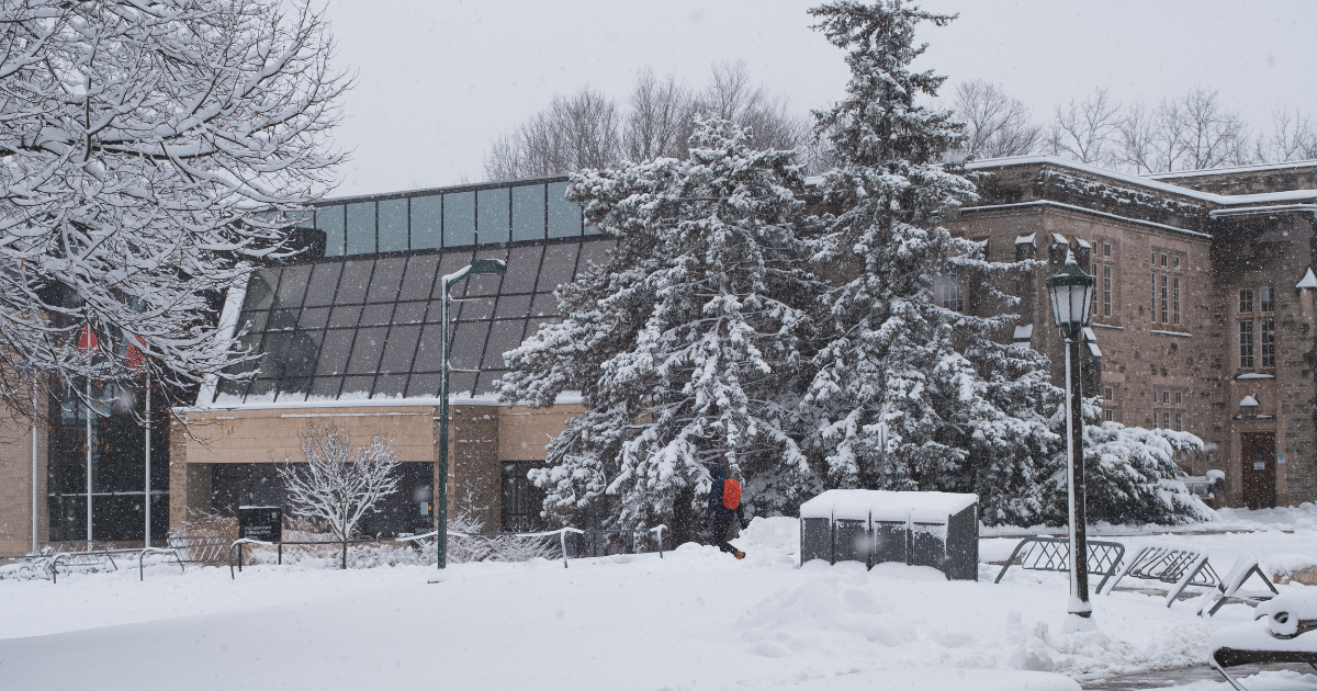A photo of the International and Grad Affairs Building on a snowy winter day