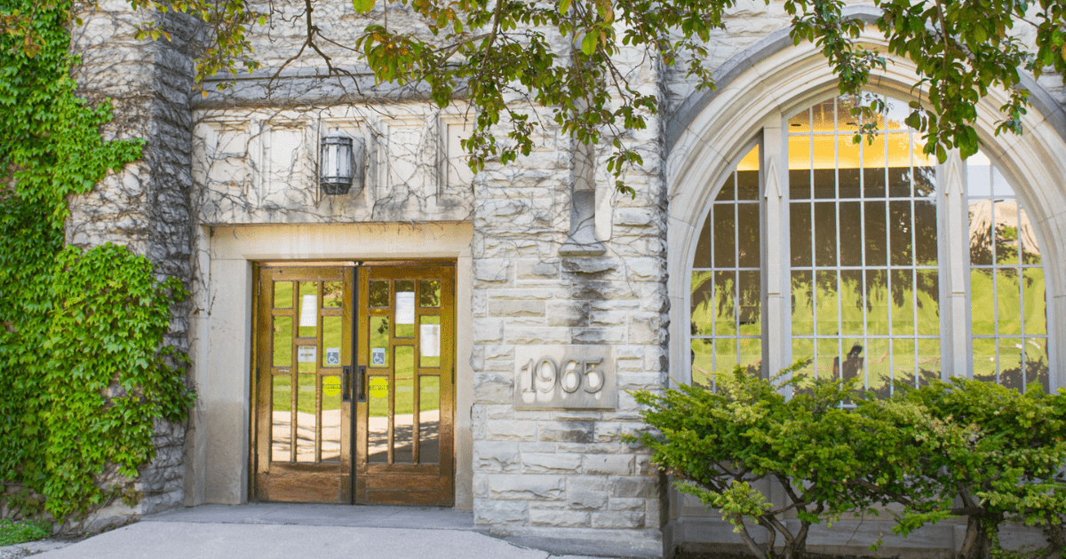 A photo of ivy growing on Talbot College on campus