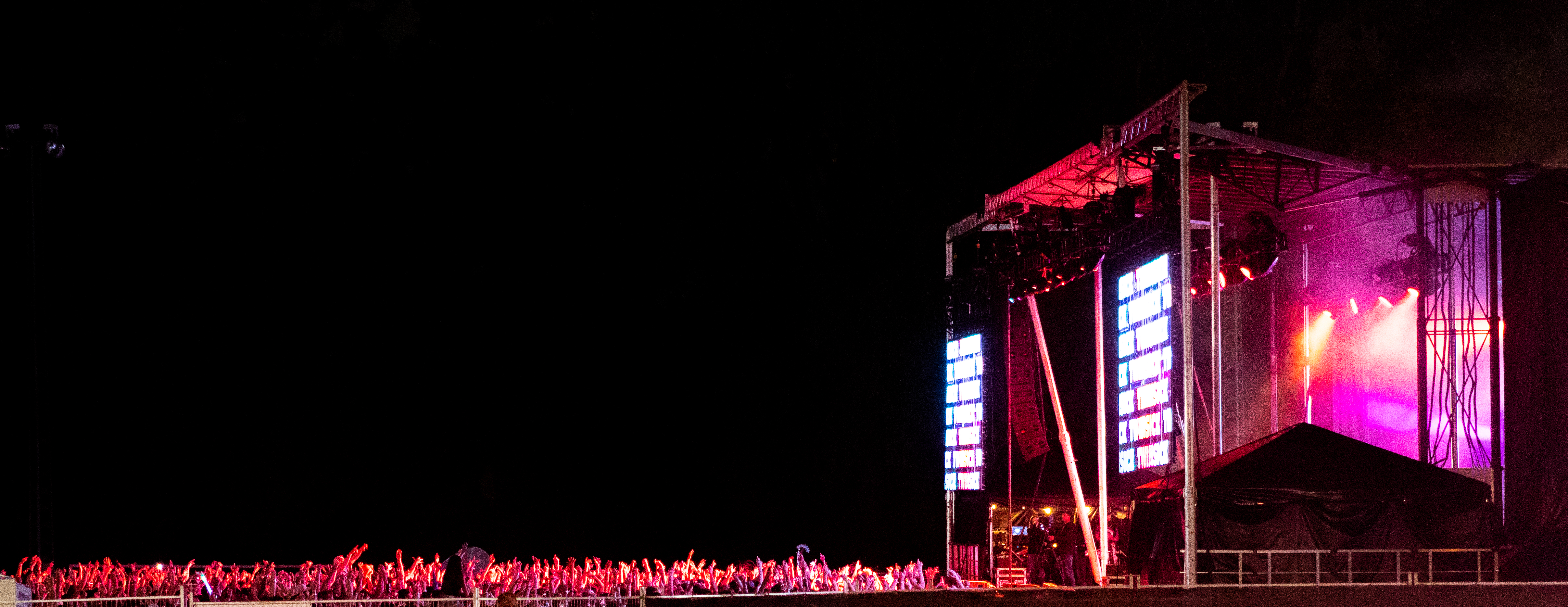 Oweek stage at night with a crowd of students from oweek 2022.