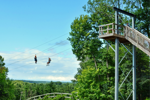 2 people ziplining at Boler Mountain.