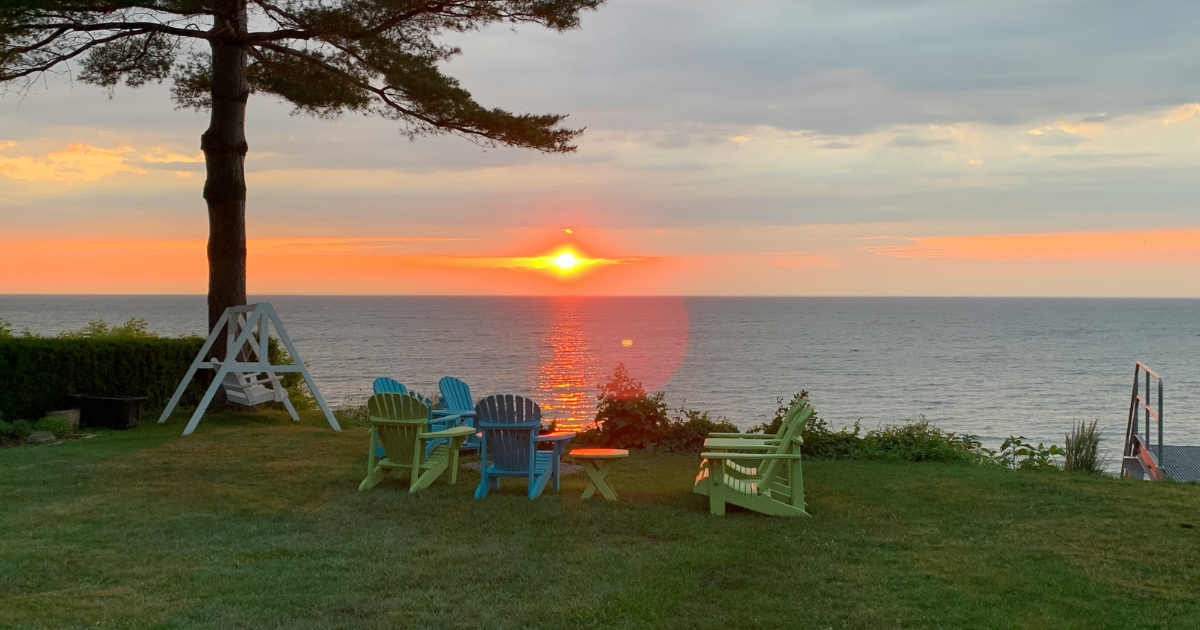photo of sunset, lake, cozy, and cottage