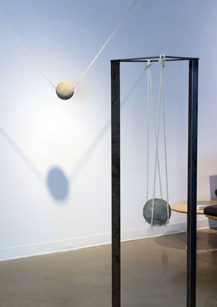 installation view, sculptures with concrete spheres and rope
