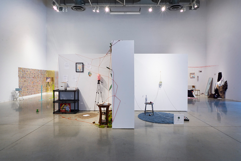 Installation image of a group exhibition of readymade-based collaborations exploring culture