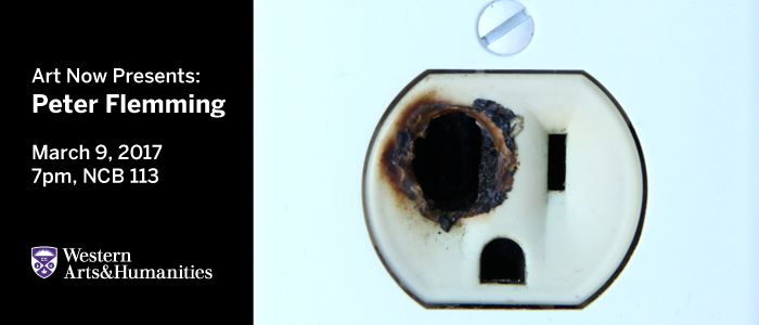 Image of an electrical socket, with one of the plug holes burnt out.