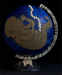 artist: Kelly Green, title: Humanity's Vast Responsibility, dee blue coloured globe painted with image of fetus connected to globe with umbilical cord